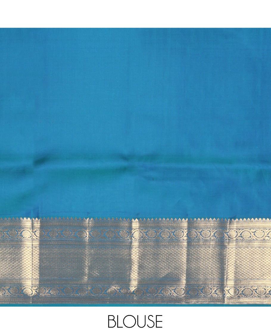 Blue Vasundhara Lite Silk Mix Saree, Graced with Zari Buttas All Over Its Body, Highlighted by a Zari Border of Rekku, Muthu, Kathir, Kodi Visiry, and Jaal Designs, Grand Jaal Pallu, and Paired with a Matching Blouse