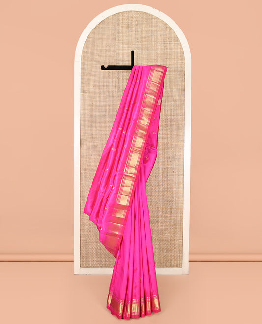 Pink Kanchipuram Silk Saree, Graced with Zari Buttas, Highlighted by a One-Sided Border of Panner Sombu, Banaras, Muthu, and Jaal Designs, Grand Pallu, and No Blouse