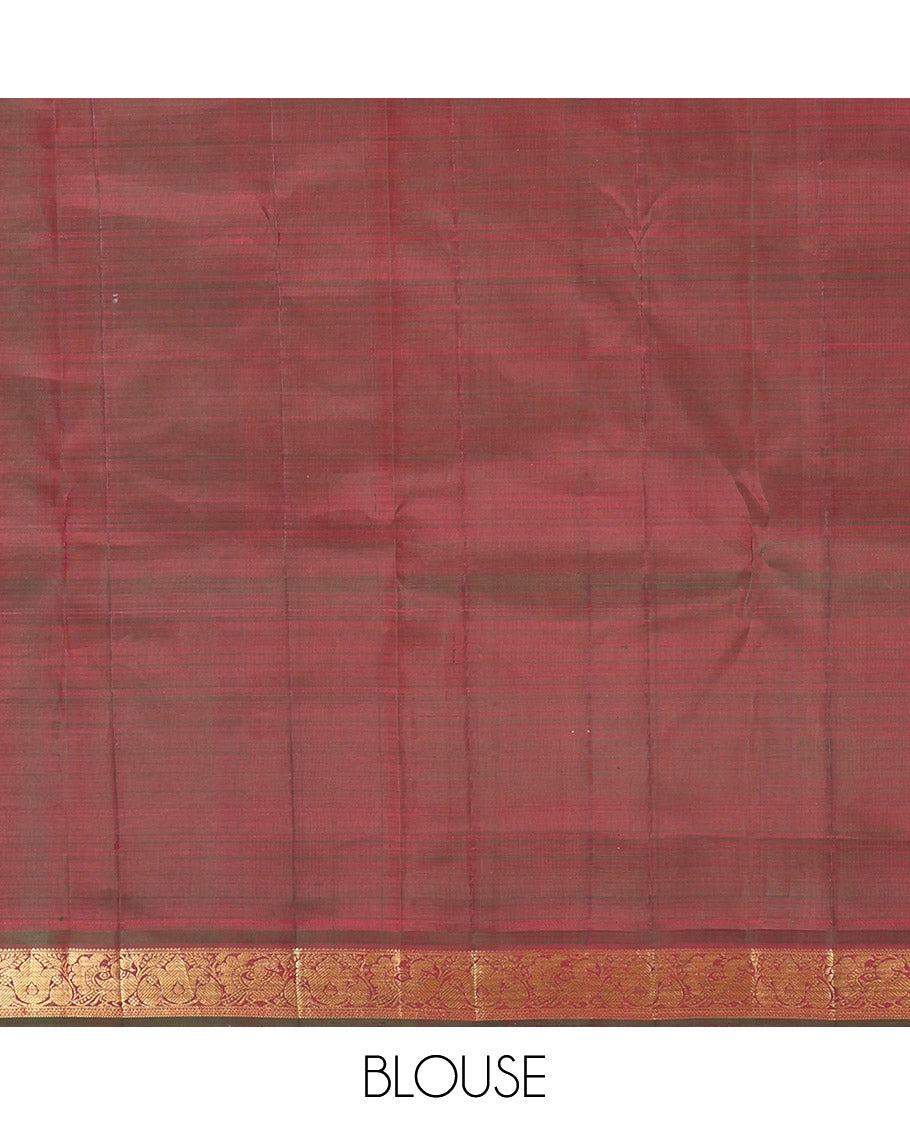 Red Kanchipuram Silk Saree, Woven with Zari Buttas All Over Its Body, Complemented by a Contrast Border of Mayil Designs, Intricately Designed Pallu, and Paired with a Contrast Blouse