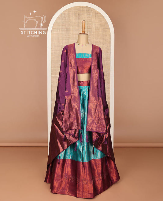 Light blue floral buttas half saree with contrast intricate zari design border, zari design blouse & floral zari design dhavavni
