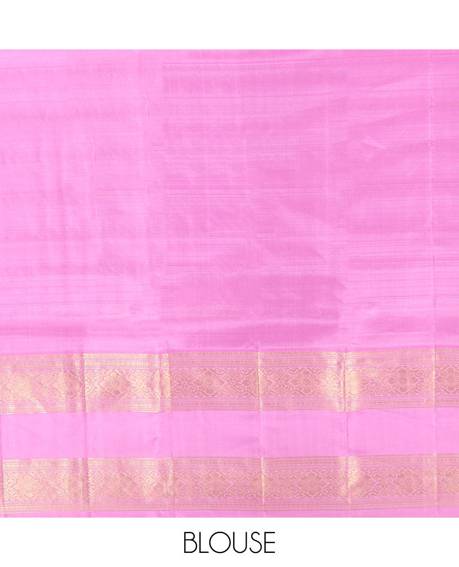 Green Vasundhara Silk Saree, Gracefully Embellished with Zari Stripes All Over Its Body, Complemented by Contrast Rettai Pettu Traditional Zari Design Border, Intricately Designed Pallu, and Paired with a Contrast Blouse