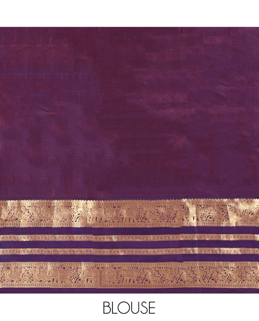 Green Vasundhara Silk Saree, Meticulously Crafted with Zari Butta Enclosed Checks All Over Its Body, Complemented by a Contrast Border of Mayil, Kuthirai, and Yaanai Designs, Grand Jaal Pallu, and Paired with a Contrast Blouse