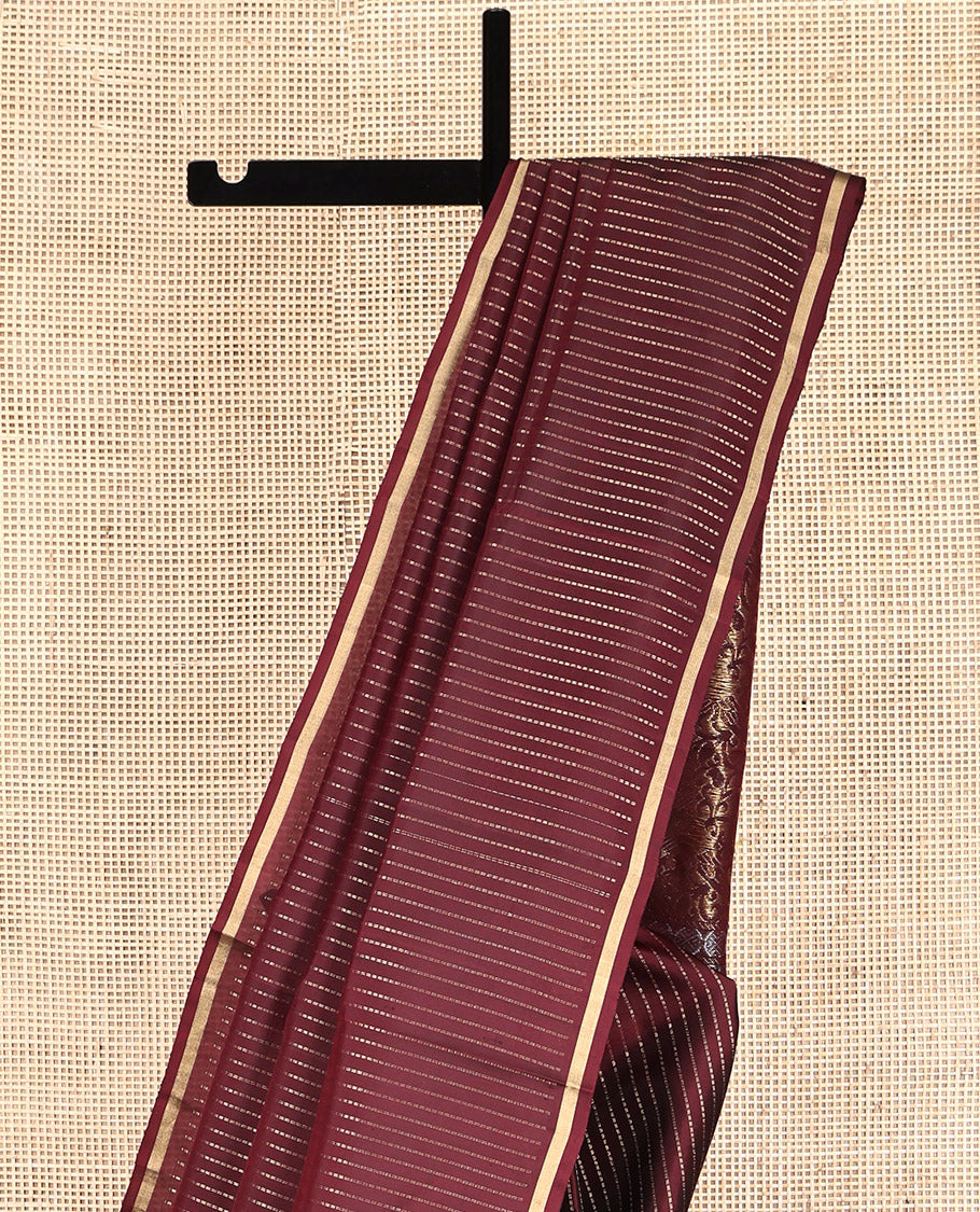 Maroon Mayuri Lite Silk Mix Saree, Highlighted by Muthu Zari Stripes, a Subtle Piping Border, Pallu Steeped with Parrot Designs, and a Matching Blouse