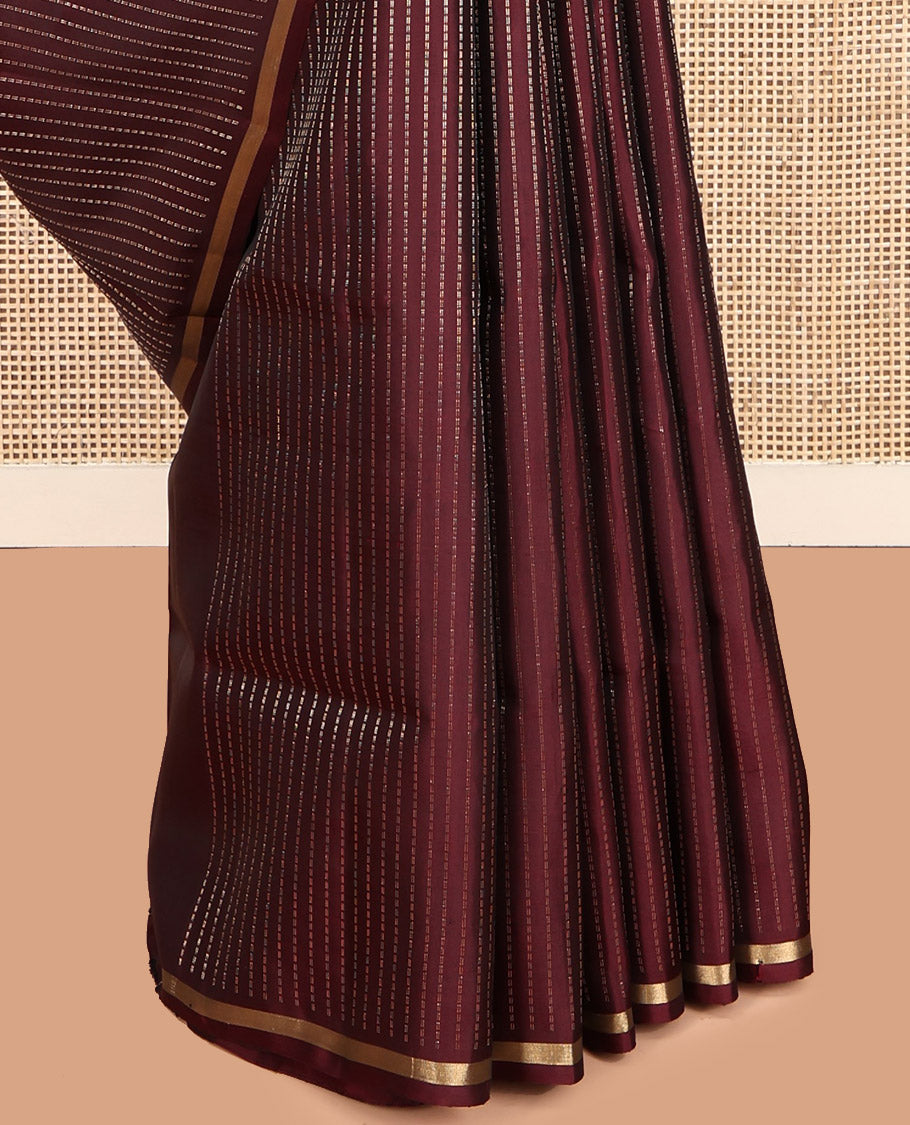 Maroon Mayuri Lite Silk Mix Saree, Highlighted by Muthu Zari Stripes, a Subtle Piping Border, Pallu Steeped with Parrot Designs, and a Matching Blouse