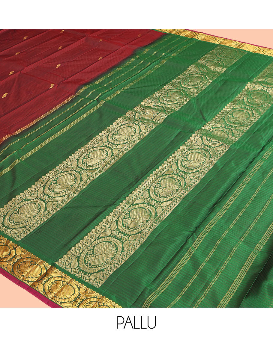Maroon Kanchipuram Silk Saree, Elevated with Vazhaipoo Stipes and Zari Buttas, a Contrast Traditional Mayil Motif Border, Pallu of Zari Design, and Contrast Blouse