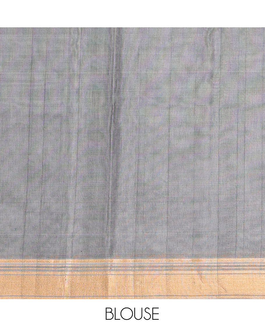 Green Cotton Saree, Highlighted by Zari Buttas, a Contrast Zari Border, an Intricate Pallu and a Contrast Blouse