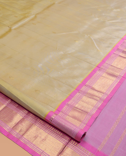 Green Kanchipuram Silk Saree, Embellished with Zari Buttas, a Contrast One-Sided Border of Paneer Sombu, Banaras, Muthu, and Mayil Kann Design, Zari Design Pallu, and No Blouse