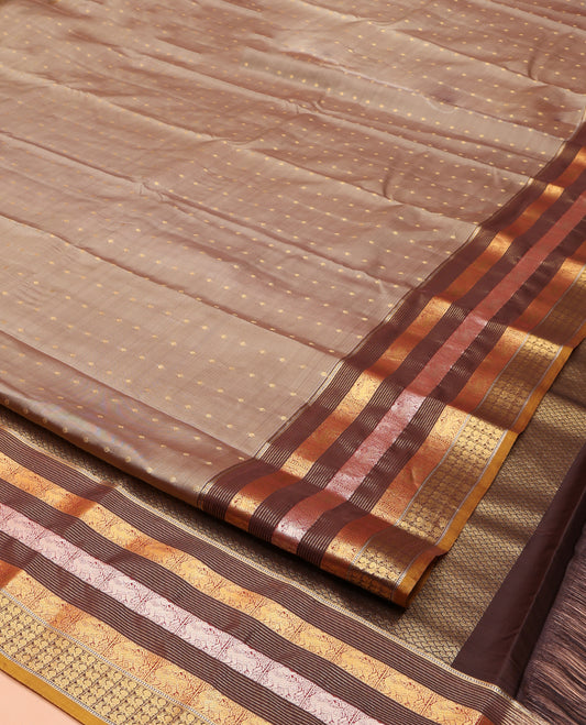 Grey Vasundhara Lite Silk Mix Saree, Elegantly Decked up with Zari Buttas on Its Body, Complemented by a Contrast Border of Muthu, Stripes, Yaali, and Mayil Designs, Intricately Designed Pallu, and Paired with a Contrast Blouse