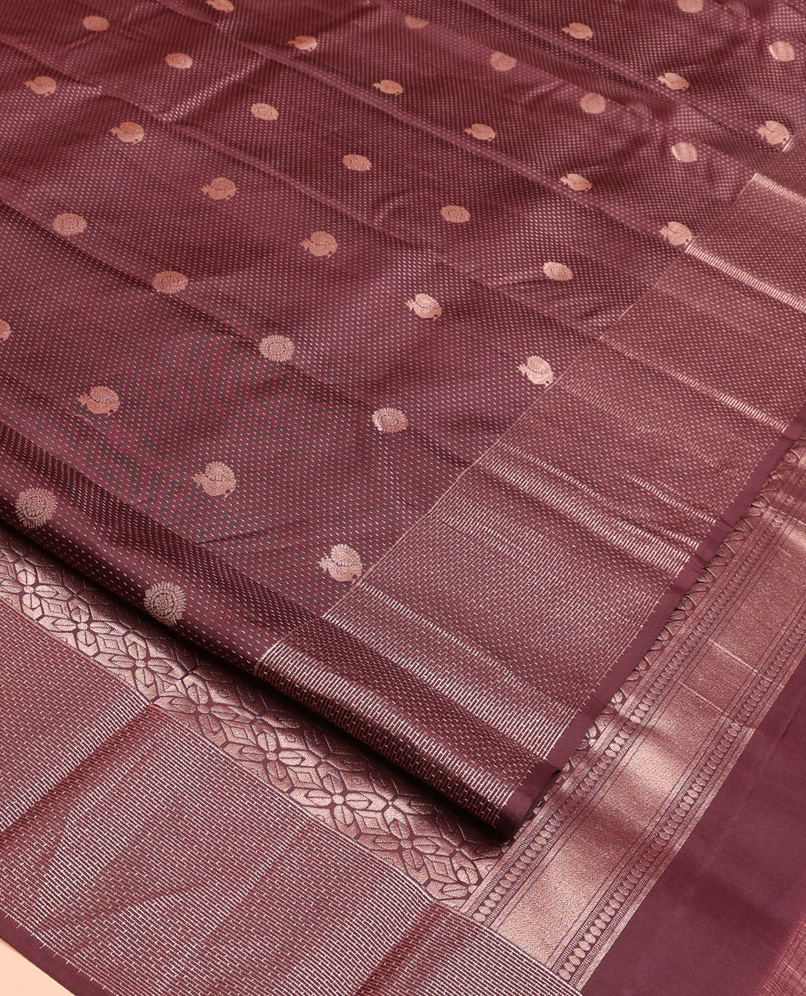 Coffee Brown Vasundhara Silk Saree, Finely Crafted with Raindrop Buttas, and Annam Chakram Bu\ttas on Its Body, Highlighted by a Zari Geometric-Textured Border, Gleaming Copper-Colored Zari Pallu of Jaal Designs, and Paired with a Matching Blouse