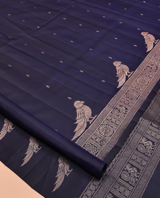 Blue Mayuri Soft Silk Saree, Finely Crafted with Buttas All Over Its Body, Highlighted by Self-Border of Parrot, Chakram, and Mayil Designs, Pallu Steeped with Parrot Designs, and Paired with a Matching Blouse