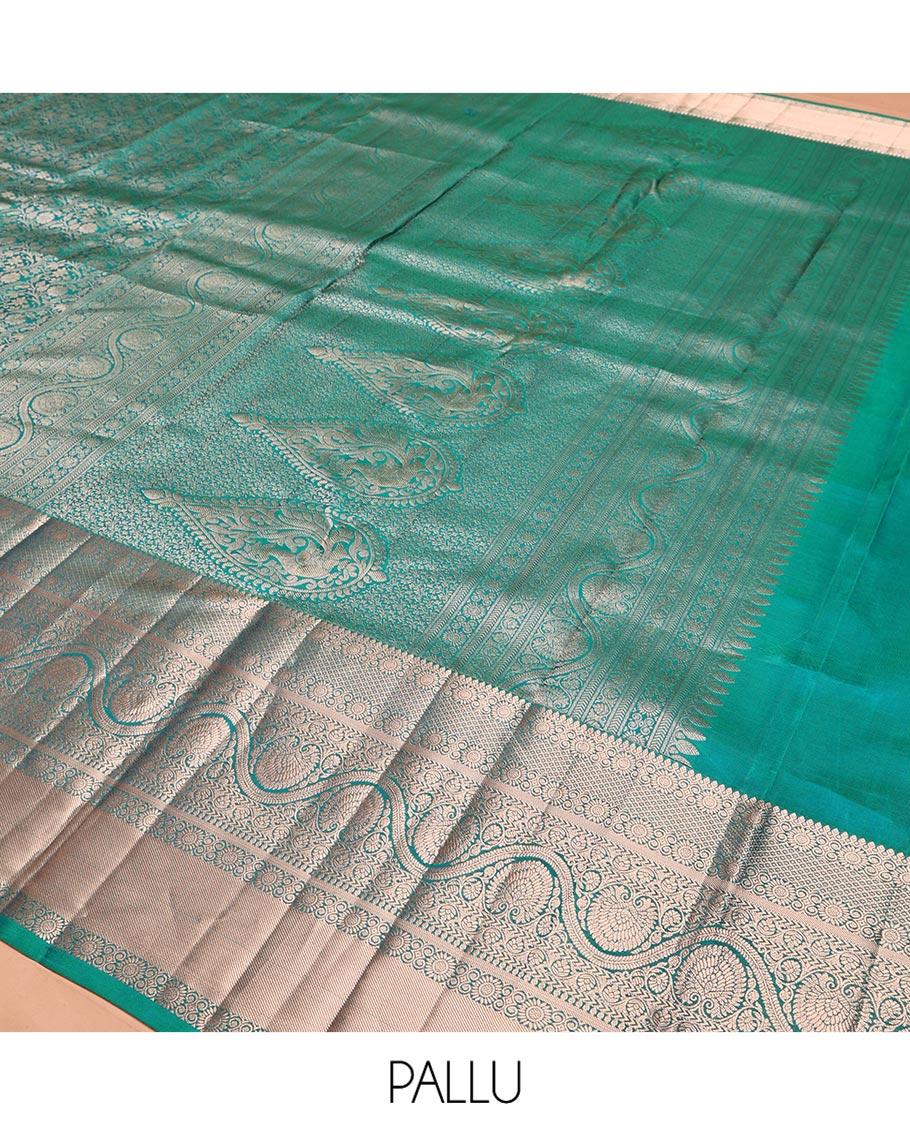 Blue Kanchipuram Wedding Silk Saree, Enriched with Jacquard Design on Its Body, Highlighted by Zari Border of Thilakam Mokku, Mayil Kann, Kathir, and Dhavana Kodi Designs, Grand Pallu, and Paired with a Matching Blouse