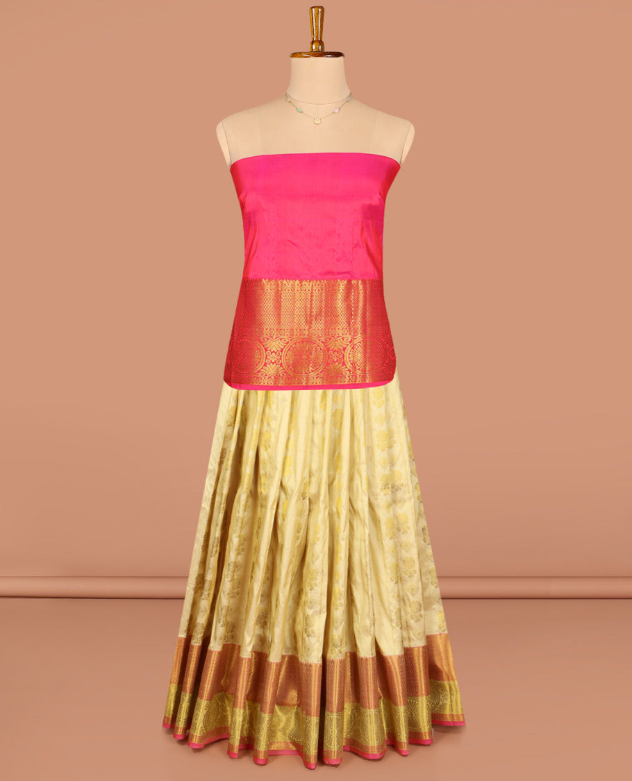Gold Pure Silk Half-Saree, Spotlighted with Zari Buttas All Over Its Skirt, Complemented by Contrast Border of Jaal and Chakram Designs, Paired with a Contrast Blouse, and Comes with a Floral Design Dhavani