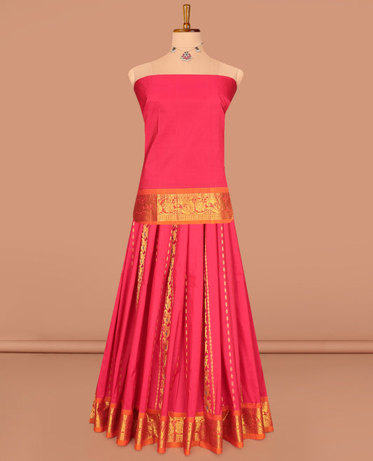 Red Art Silk Pavadai Material Set, Elevated with Zari Designs on Its Skirt, Complemented by a Contrast Paisley Zari Border, and a Matching Blouse