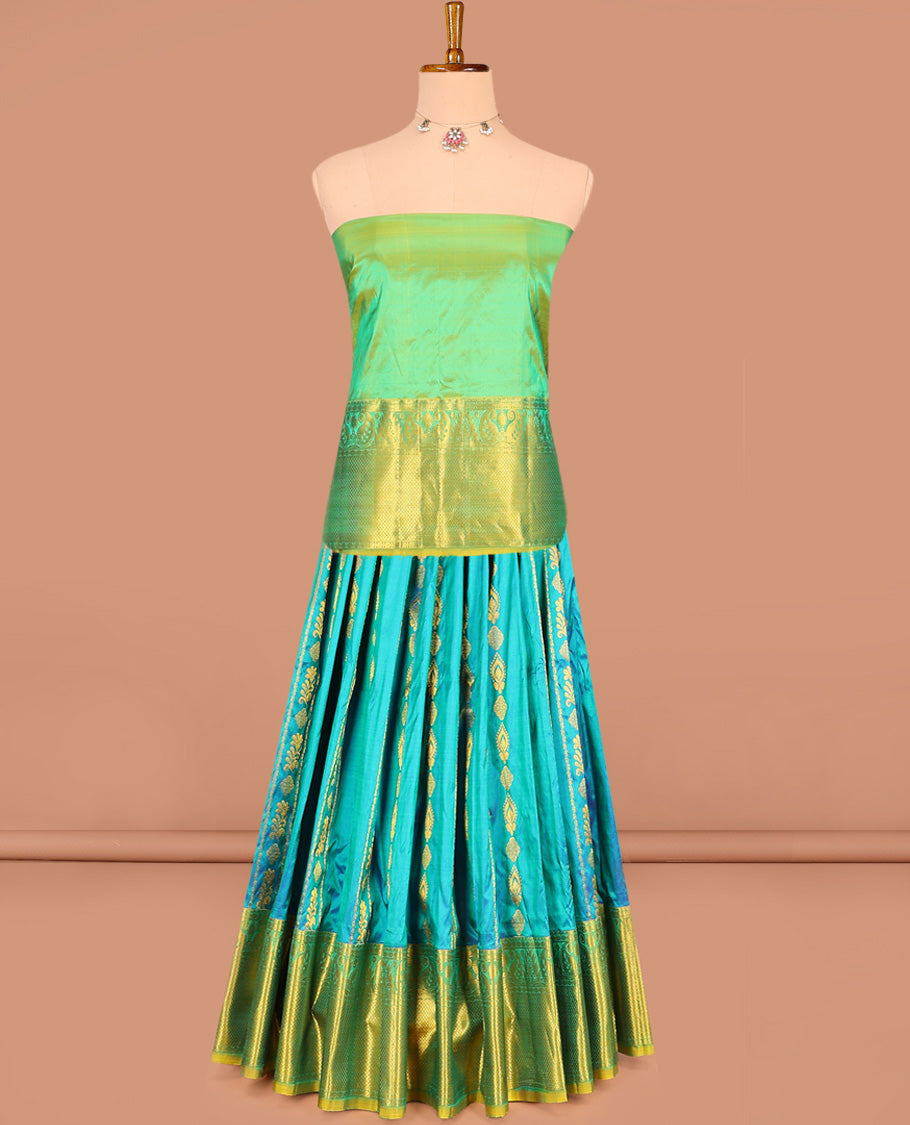 Blue Pure Silk Half-Saree Gracefully Highlighted with Zari Designs on Its Skirt, Complemented by a Contrast Border Featuring Neli, Manga, Rekku, Rudraksham, and Mayil Kann, Comes with a Contrast Blouse and a Dhavani of Butta Enclosed Jaal Designs