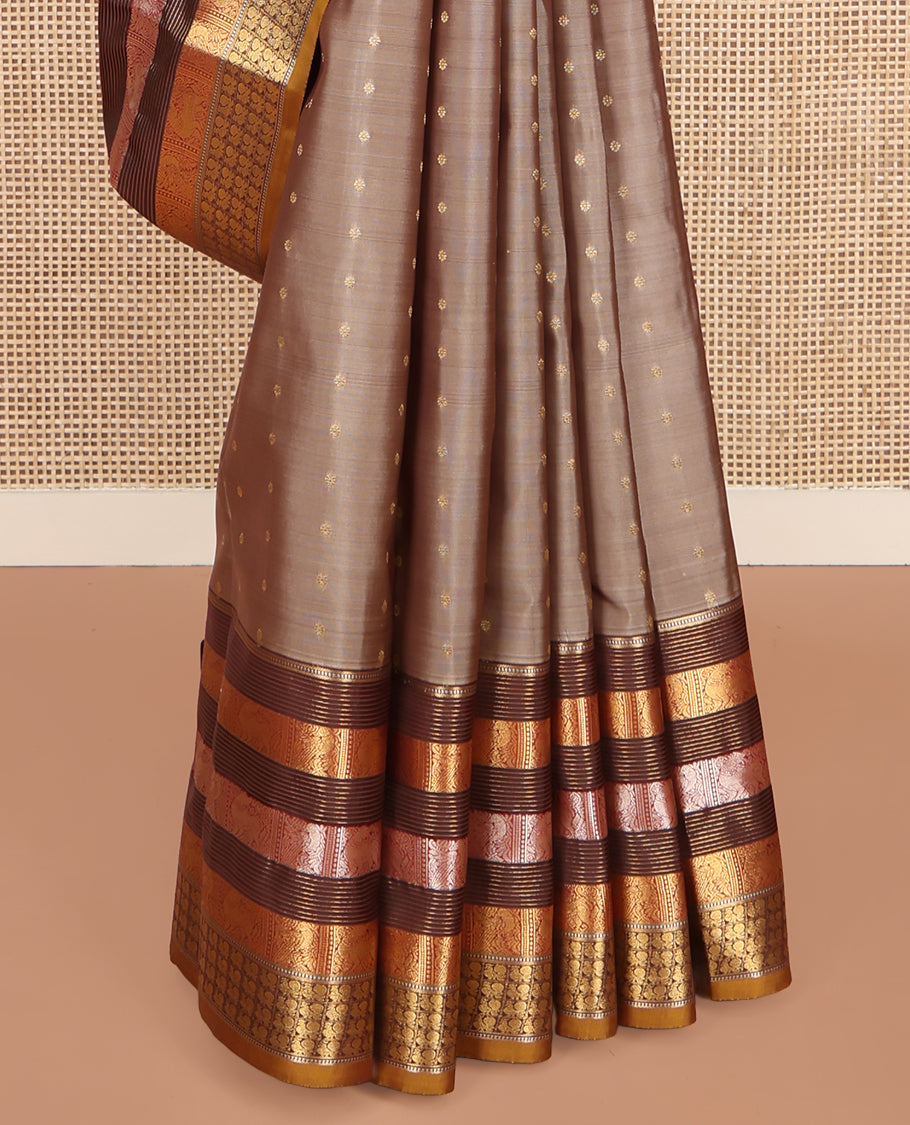 Grey Vasundhara Lite Silk Mix Saree, Elegantly Decked up with Zari Buttas on Its Body, Complemented by a Contrast Border of Muthu, Stripes, Yaali, and Mayil Designs, Intricately Designed Pallu, and Paired with a Contrast Blouse