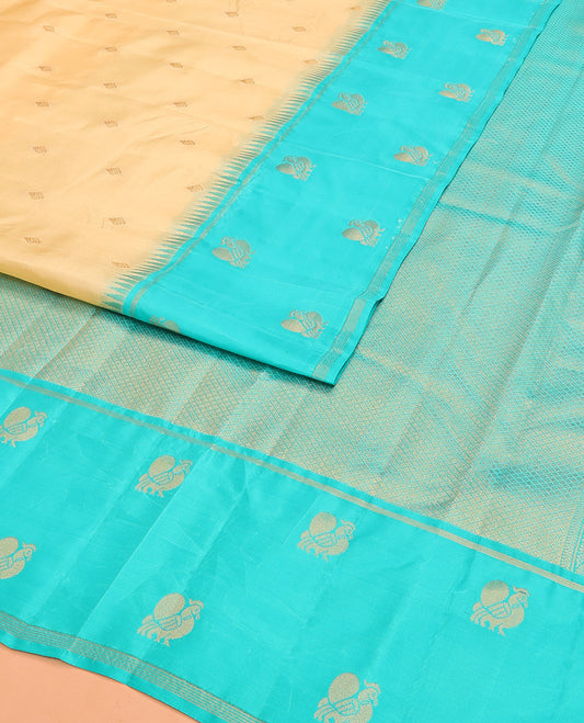 Sandal Vasundhara Lite Silk Mix Saree Enlivened With Zari Buttas, Featuring a Contrast Border of Thazampoo Rekku,  and Mayil Designs, Zari Woven Pallu of Jaal Designs, and a Contrast Blouse