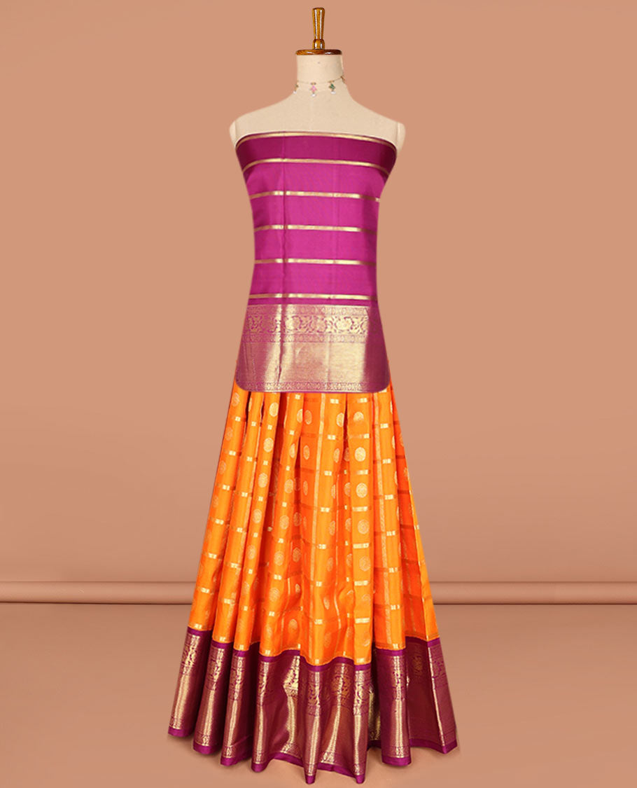 Orange pure-silk half saree, chakram butta enclosed checked skirt, contrast border & blouse of banaras,mayil kann & kodi visiry & intricate dhavani