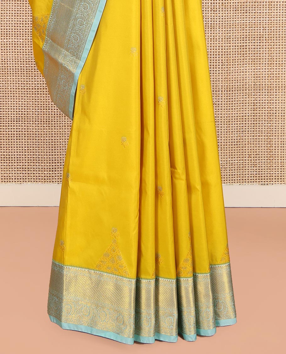 Yellow Budget Silk Saree, Sparsely Woven with Zari Buttas on Its Body, Complemented by Contrast Traditional Zari Border of Floral Creeper Designs, Intricately Designed Pallu, and Paired with a Contrast Blouse