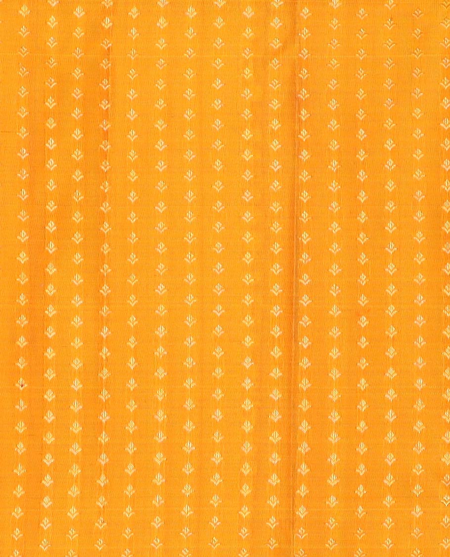 Orange pure-silk half-saree, buttas with a contrast mayil chakram bordered skirt, contrast blouse, and a leaf jaal dhavani