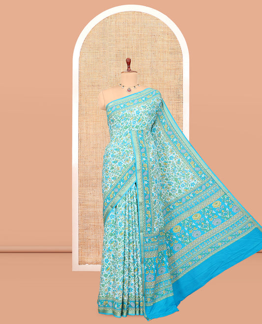Blue Printed Silk Saree, Detailed with Floral Vine Print, a Zari Floral Printed Border, Floral Print Pallu, and a Matching Blouse