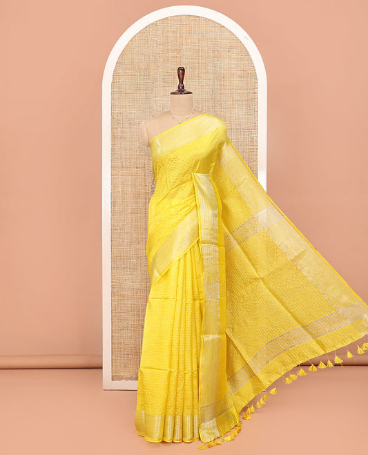 Yellow Banana Pith Saree, Subtly Sparkled with Zari Stripes All Over Its Body, Subtly Woven Border, Subtly Striped Pallu, and Paired with a Matching Blouse