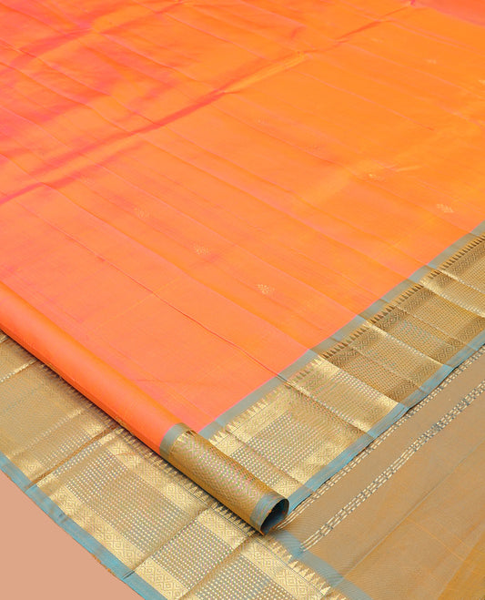 Orange Kanchipuram Silk Saree, Bedecked with Zari Buttas, Complemented by a Contrast Border of Rekku, Mayil Kann, and Muthu Design, Pallu of Zari Design, and No Blouse
