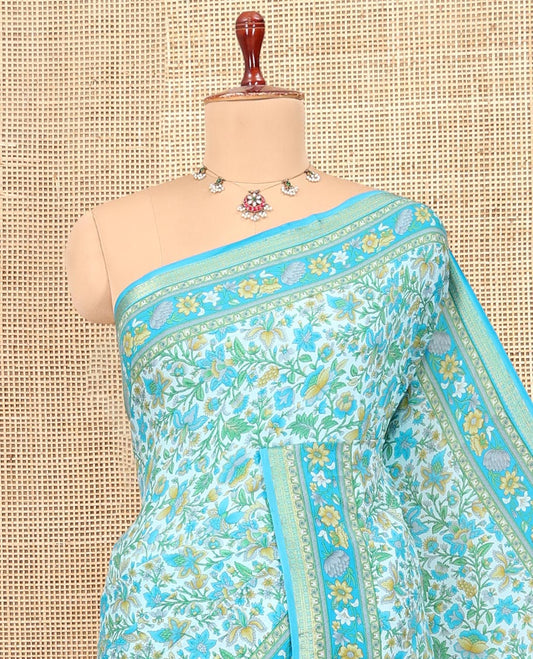 Blue Printed Silk Saree, Detailed with Floral Vine Print, a Zari Floral Printed Border, Floral Print Pallu, and a Matching Blouse