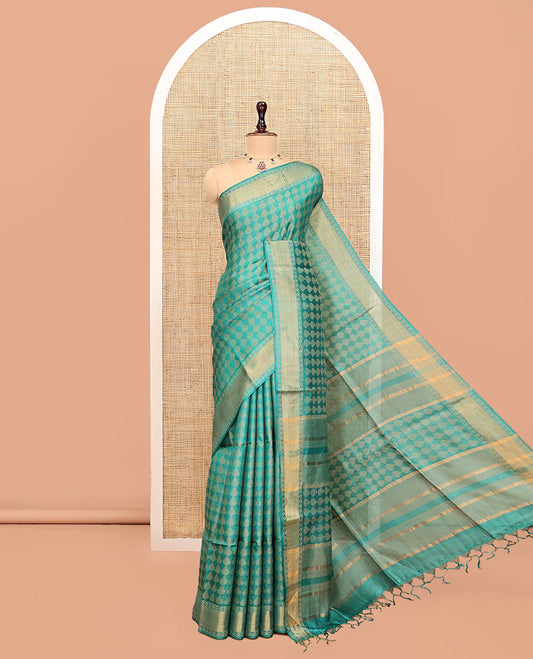 Green Tussar Silk Saree, Adorned with Buttas, a Subtle Border, Pallu of Stripes and Buttas, and a Matching Blouse