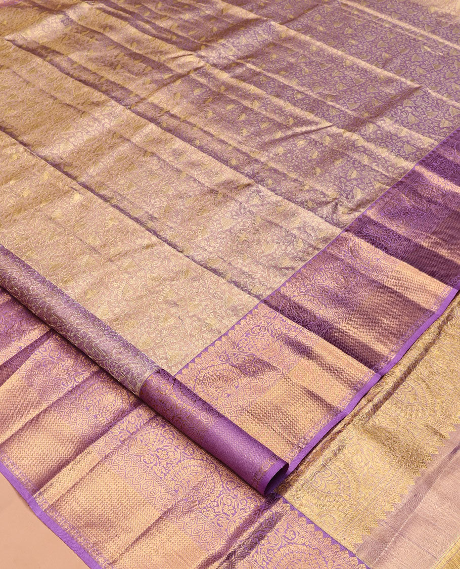 Lavender Kanchipuram Tissue Silk Saree, Elegantly Highlighted with Jacquard Design, Complemented by Contrast Border of Thilakam Mokku, and Vanki Designs, Grand Pallu, and Matching Blouse
