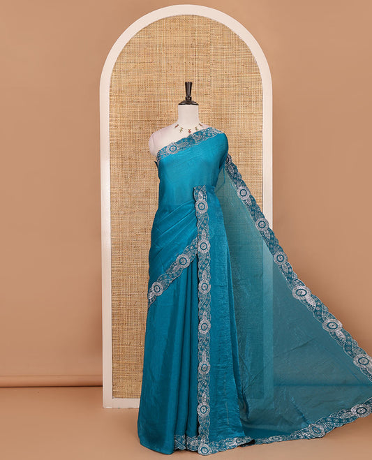 Rama green full-plain fendy chiffon saree, scallop swarovski stone work geometric border and contrast plain blouse