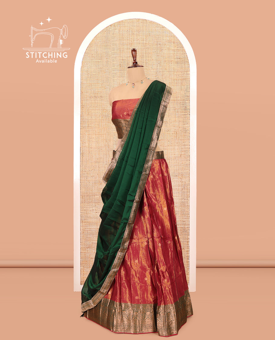 Rust-Green Shimmer Tissue Half-Saree Features Buttas Skirt, a Contrast Traditional Border, a Matching Blouse, a Contrast Dhavani