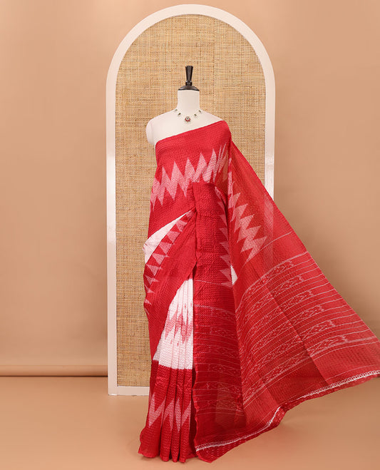 Borderless white 3-layer ikkat chevron printed litchi crushed saree, ikkat printed pallu & small butta printed red blouse