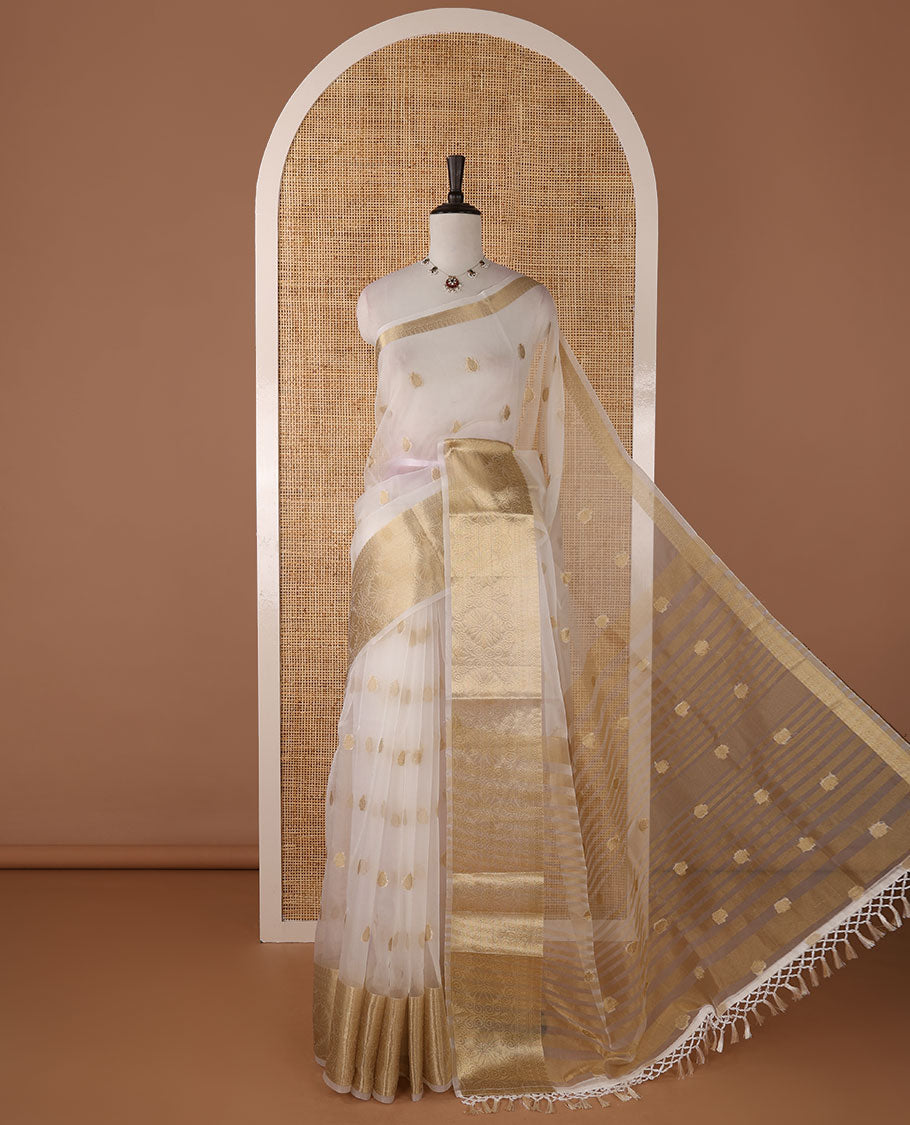 White semi-organza saree with zari buttas, zari border of temple & floral creeper designs, zari design pallu & running blouse