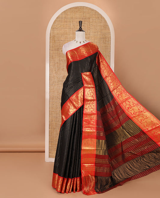 Navy blue zari checked semi-taffeta silk saree, contrast deer motifs zari woven temple border, striped pallu & contrast striped zari border blouse
