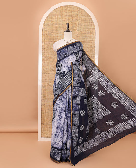 Navy blue batik-printed sungudi cotton saree, mango zari small border, batik-printed pallu & running blouse