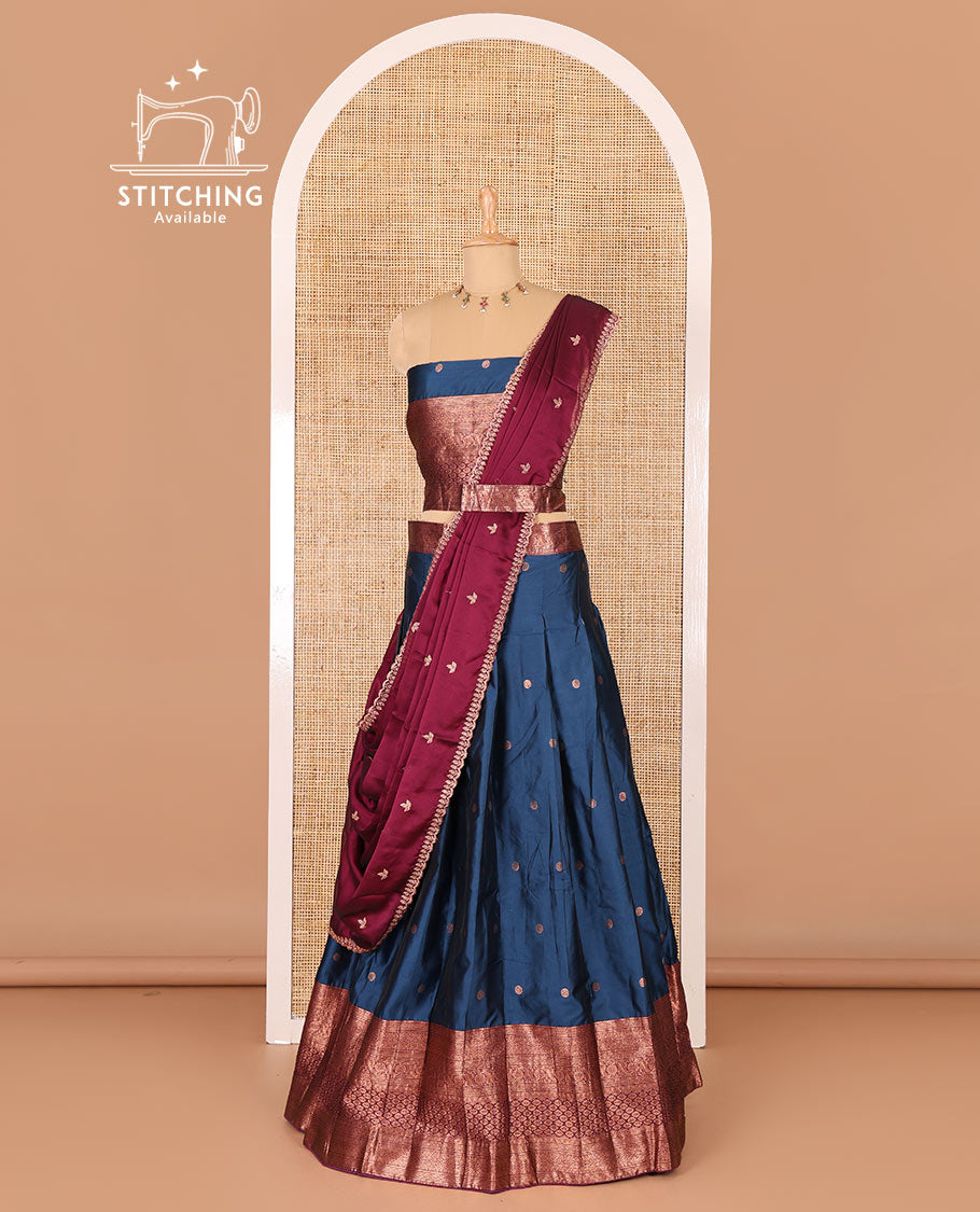 Peacock blue taffeta silk half-saree, flower zari buttas and contrast traditional zari bordered skirt, a matching blouse, and contrast embroidered satin georgette scallop dhavani
