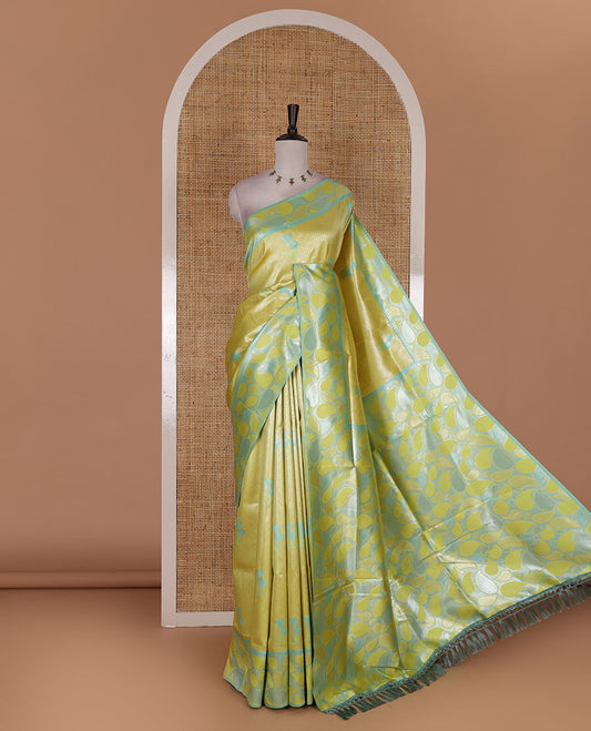 Green jacquard kanchi silk saree, contrast border, and pallu steeped with paisley motifs with contrast zari design blouse