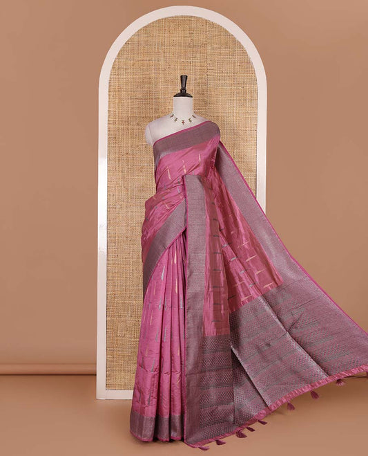 Pink buttas woven semi-tussar saree, zari border, geometric patterned pallu, and a matching blouse