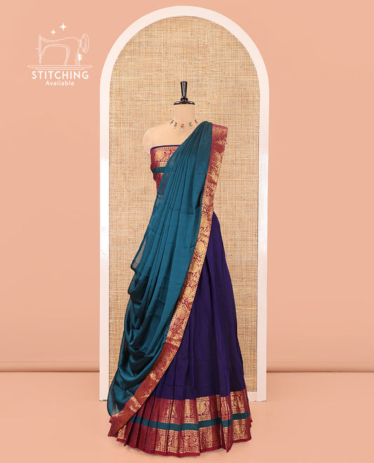 Deep Violet-Rama Mercerised Cotton Half-Saree Features Plain with Contrast Peacock and Floral Creeper Zari Bordered Skirt, Paired with a Matching Blouse, and Comes with a Contrast Floral Creeper Zari Bordered Dhavani