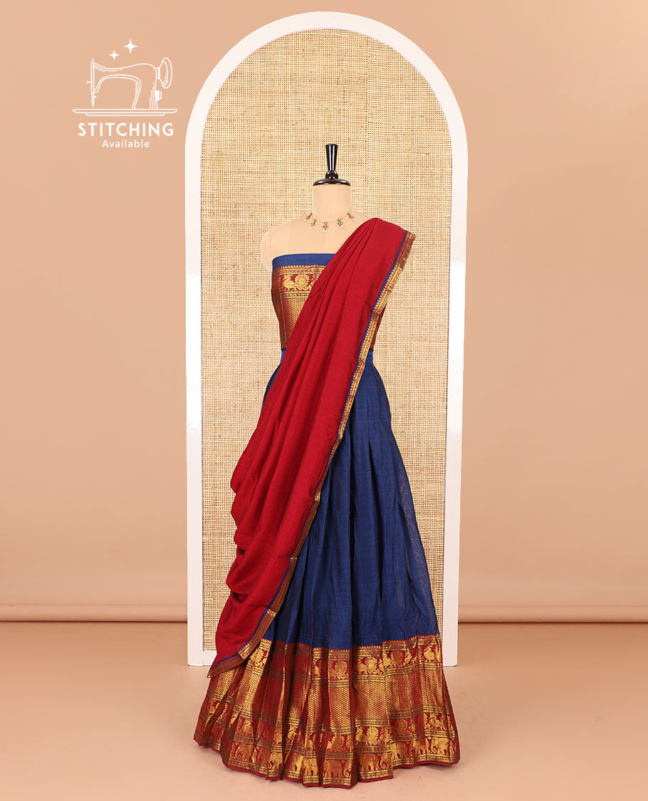 Blue half-saree, plain with big contrast traditional zari motifs steeped border skirt, matching blouse and a plain zari border contrast dhavani