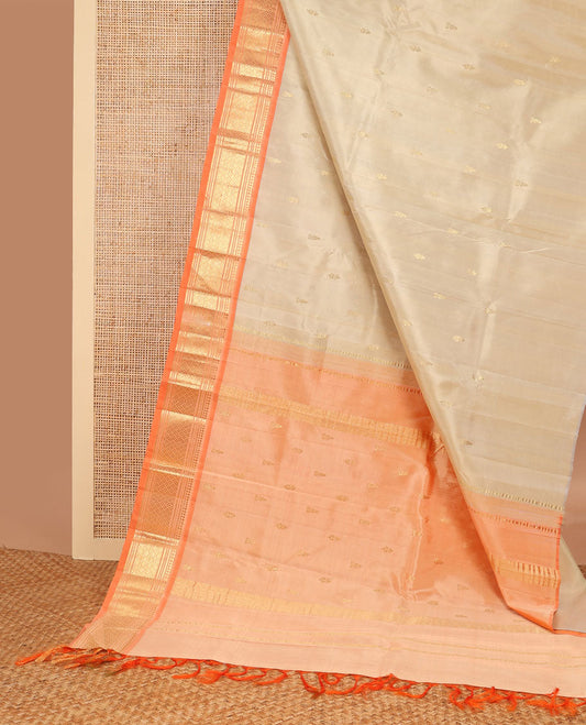 Beige buttas kancheepuram silk saree with contrast border of thilakam, mokku, banaras, kuyil kann design border & zari design pallu