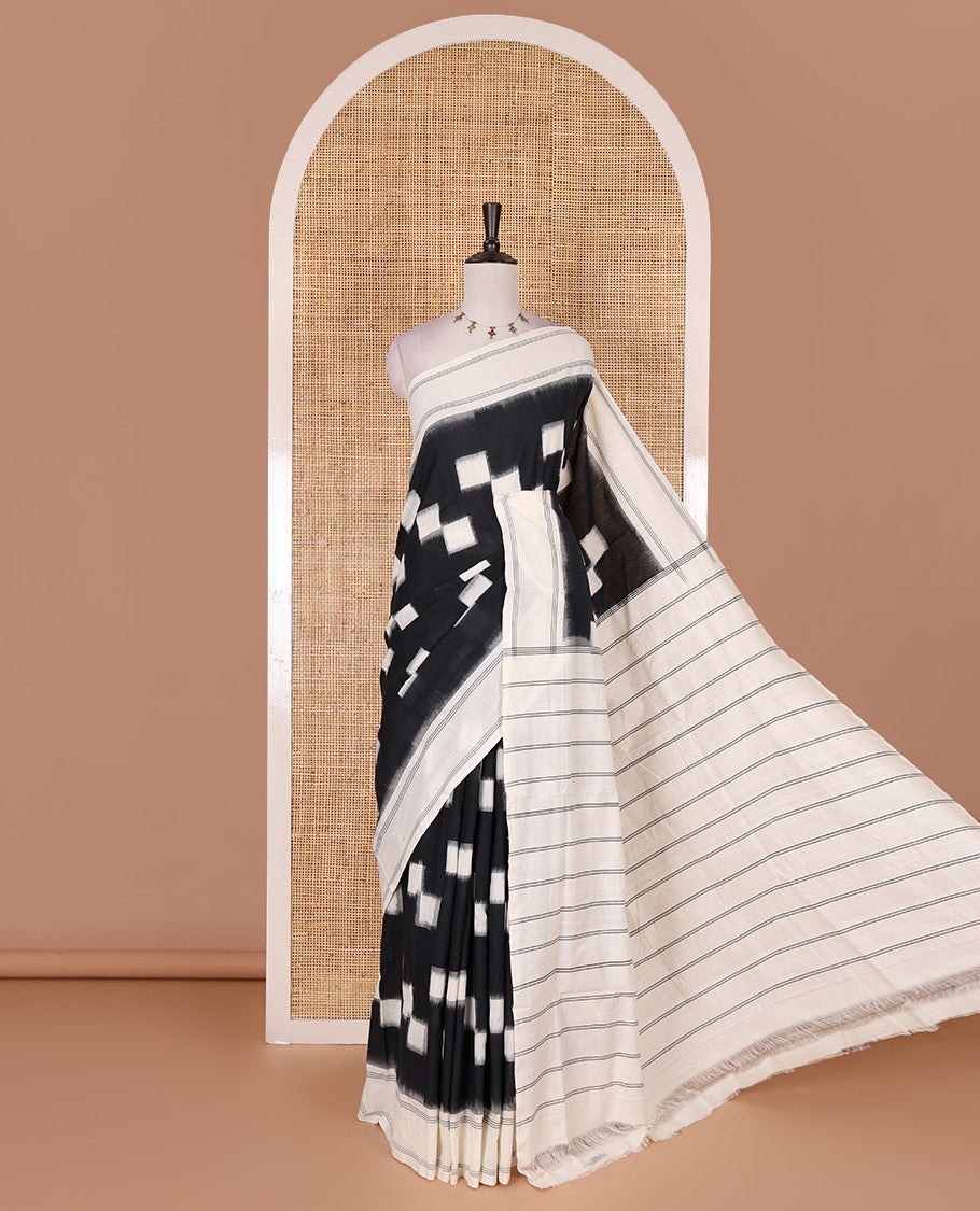 Black and white checked blocks patterned ikkat cotton saree, contrast plain border, striped pallu, and contrast plain blouse
