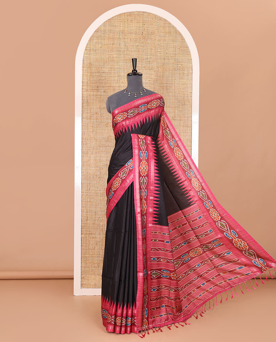 Black plain Katan silk saree, contrast temple ikkat floral printed border, ikkat floral printed pallu, and ikkat printed blouse