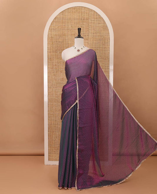 Dark violet Swarovski stone work embedded fendy-chiffon saree, scallop lace border & floral mixed embroidered blouse