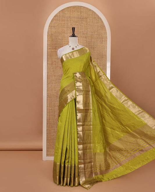 Green plain tussar saree, traditional zari design border, pallu of zari stripes & matching traditional motif border blouse