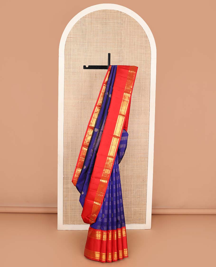 Blue zari stripes, and buttas Kanchipuram korvai silk saree, contrast rettai pettu neer korvai border of thilakam mokku, neli, muthu, kodi visiry, manga, yaanai, and mayil designs, and vanki design pallu