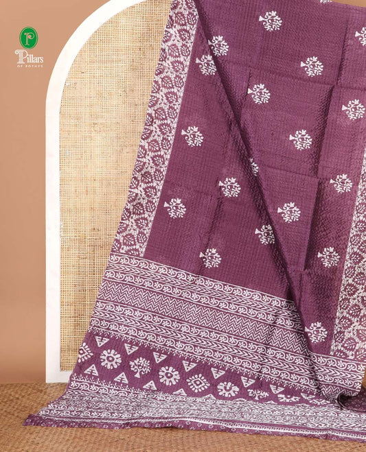 Purple batik-style tree motif printed litch crushed saree, leaf print border, floral-geometric print pallu & floral print blouse