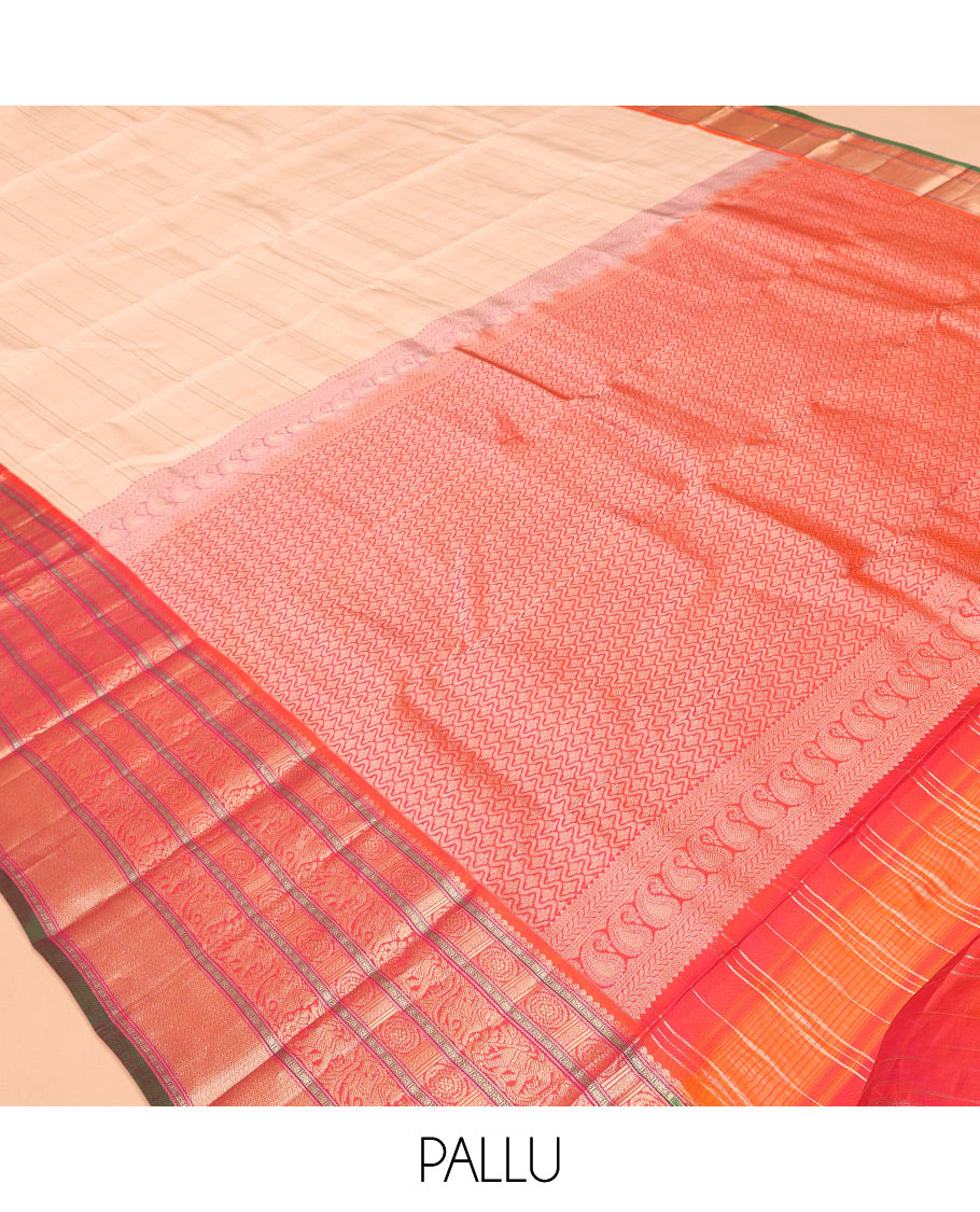 Sandal Vasundhara Silk Saree Subtly Sparkled with Zari Checks, Complemented by a Contrast Border of Thilakam Mokku, Chakram, Kodi Yaanai, Kuthirai, and Mayil Kann, Intricately Designed Pallu, and Paired with a Contrast Blouse