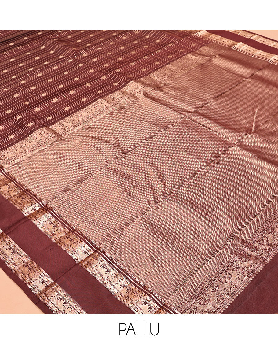 Maroon Kanchipuram Silk Saree, Detailed with Buttas and Checks, a Zari Rettai Pettu Border of Thazampoo Rekku, and Mayil Designs, Grand Pallu, and a Matching Blouse