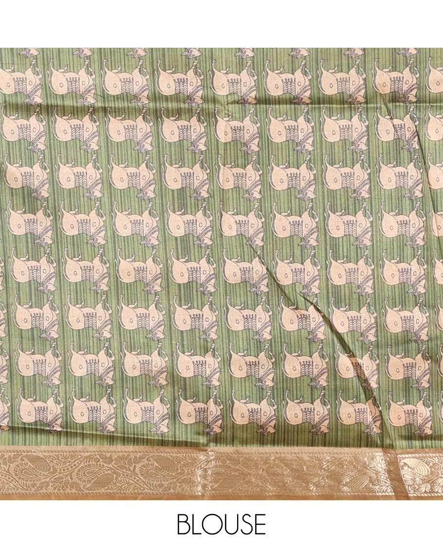 Chikku striped semi-tussar saree, traditional zari border of floral creeper designs, contrast pallu of Pichwai cow print, and contrast Pichwai cow printed blouse